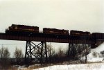 Local rolls west off the Oliver Bridge